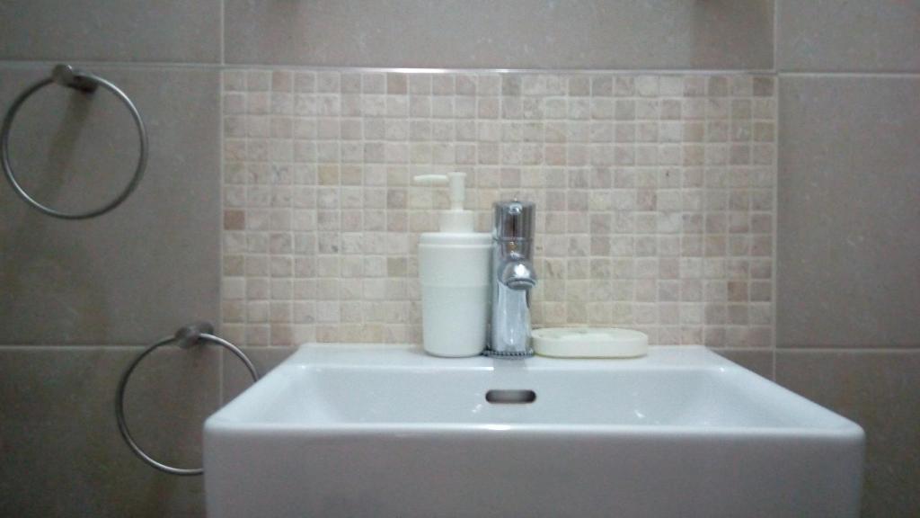 Koupelna v ubytování AMD Infinity Suites