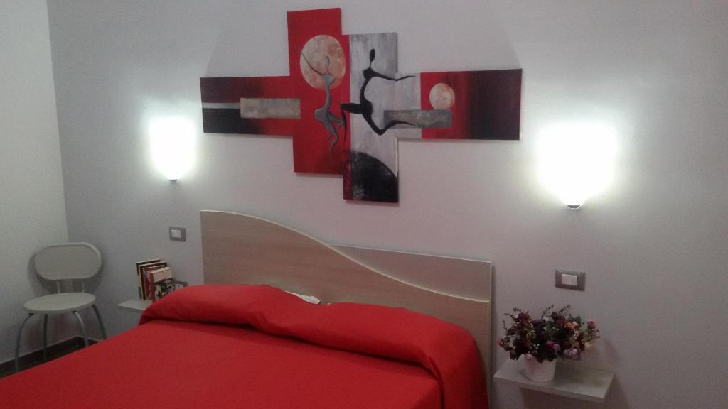 Postel nebo postele na pokoji v ubytování B&B HF Fiorella