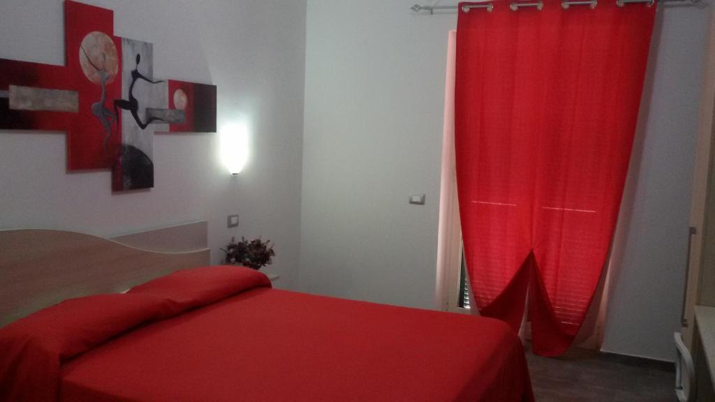 Postel nebo postele na pokoji v ubytování B&B HF Fiorella