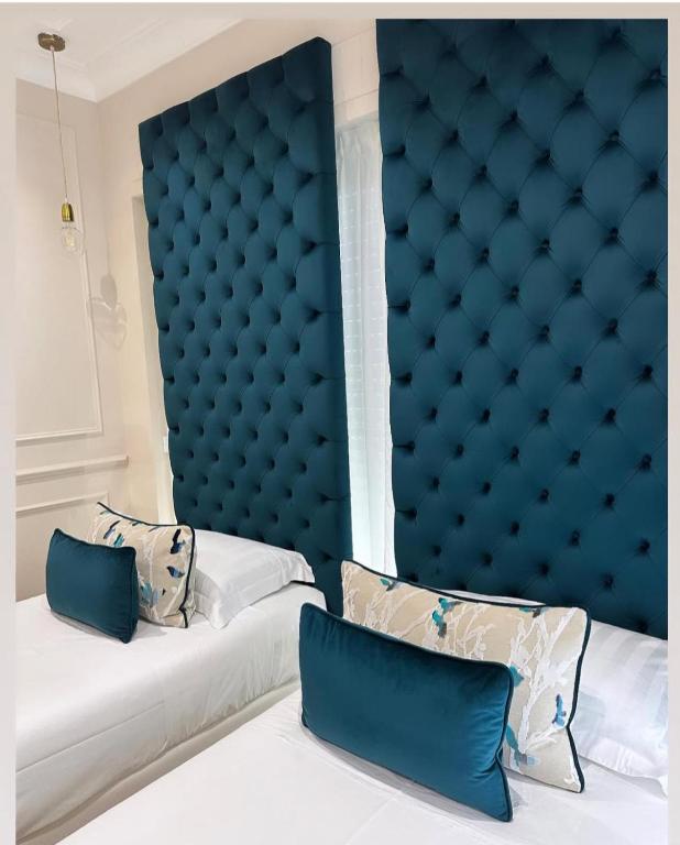Posteľ alebo postele v izbe v ubytovaní Nouvelle Maison Rome Luxury Palace