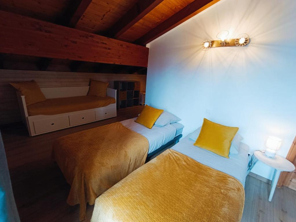 Postel nebo postele na pokoji v ubytování Le Bargeot à Baar