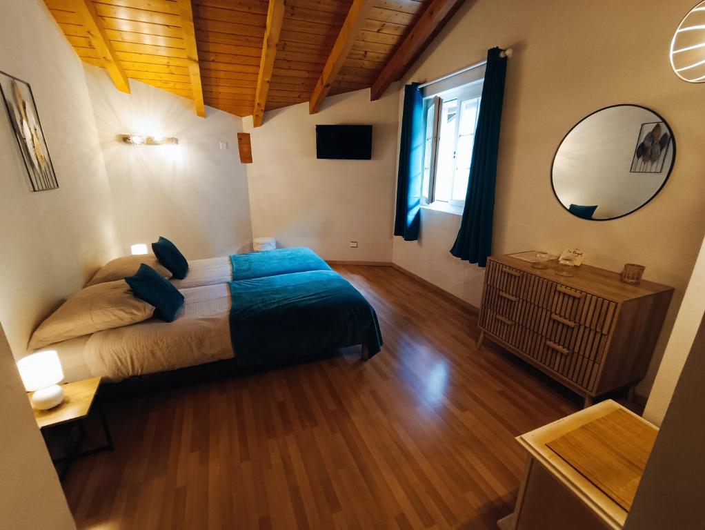 Postel nebo postele na pokoji v ubytování Le Bargeot à Baar