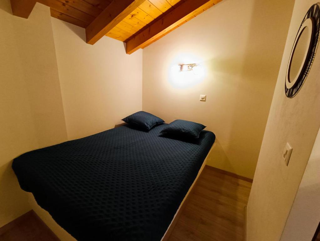 Postel nebo postele na pokoji v ubytování Le Bargeot à Baar