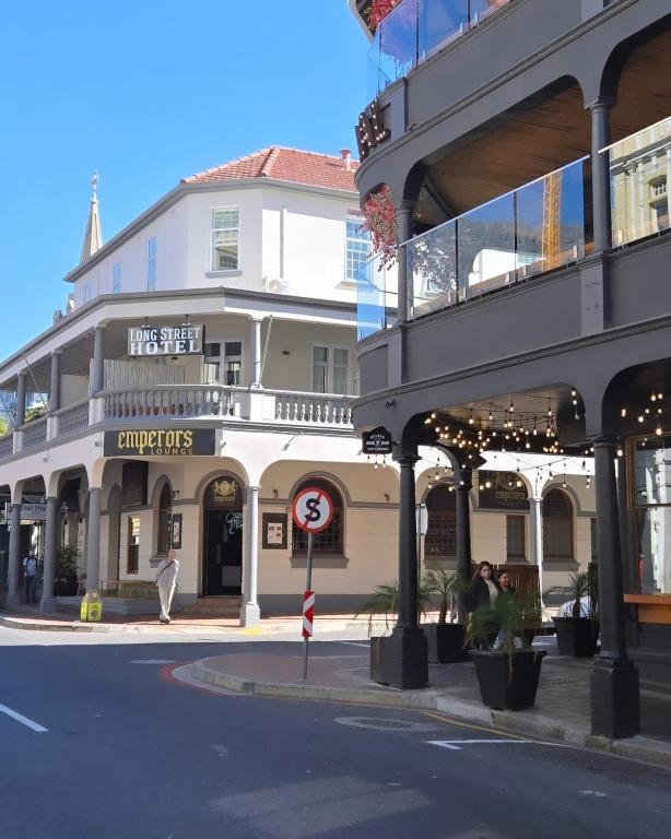 a building on a city street with a street sign at Long Street Boutique Hotel in Cape Town