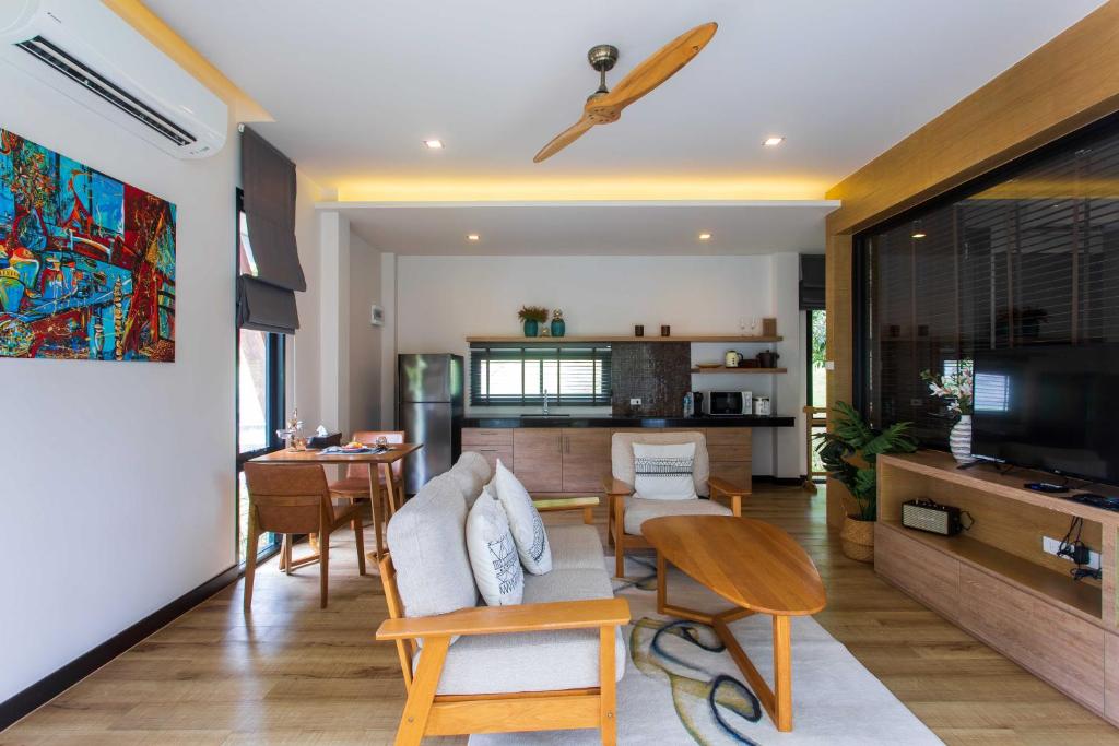 Posezení v ubytování CHUZ Villas Samui SHA Plus