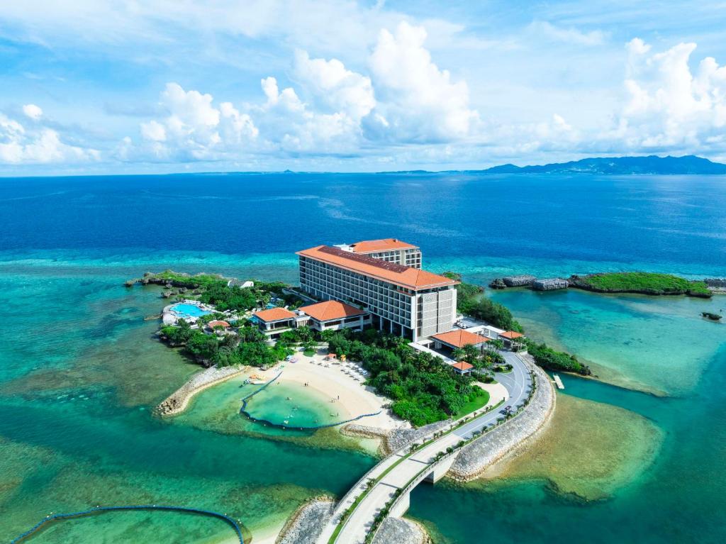 an aerial view of a resort on a island in the water at Hyatt Regency Seragaki Island Okinawa in Onna