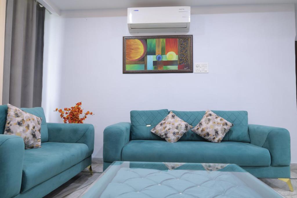 Posezení v ubytování Aaranya Nivas 4BHK Stay