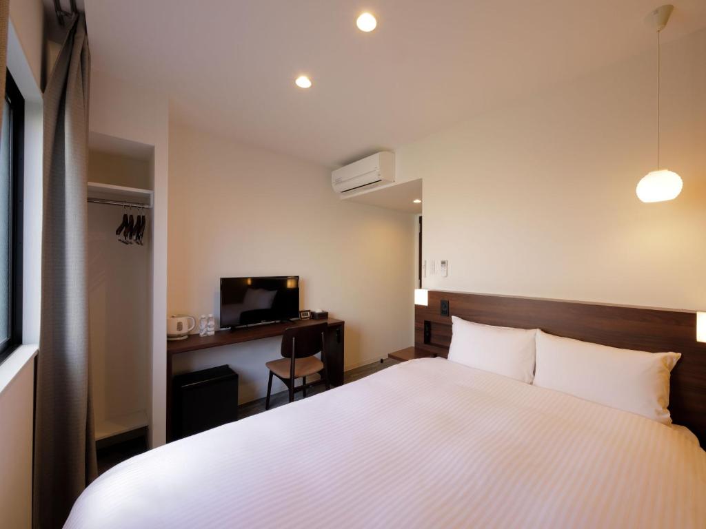 Foto 6 de Smart Place Inn Kyoto Shijo Omiya East