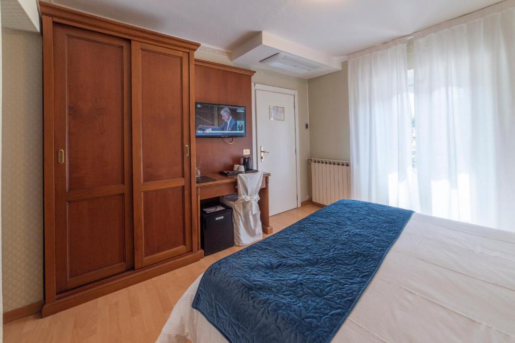 Posteľ alebo postele v izbe v ubytovaní Hotel Due Palme
