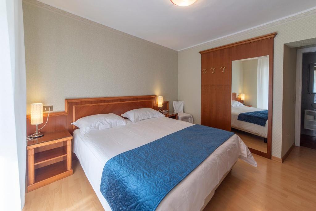 Posteľ alebo postele v izbe v ubytovaní Hotel Due Palme