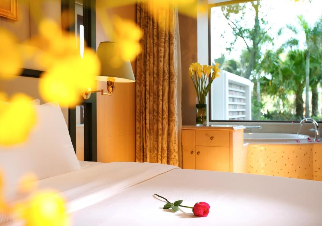Postel nebo postele na pokoji v ubytování Seaview Resort Xiamen