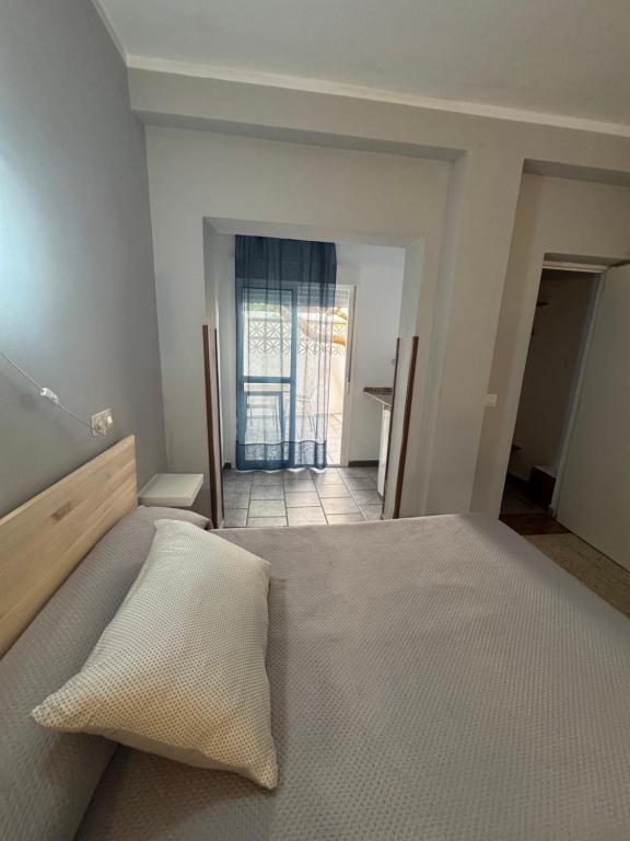 Postel nebo postele na pokoji v ubytování Hostal Miramar