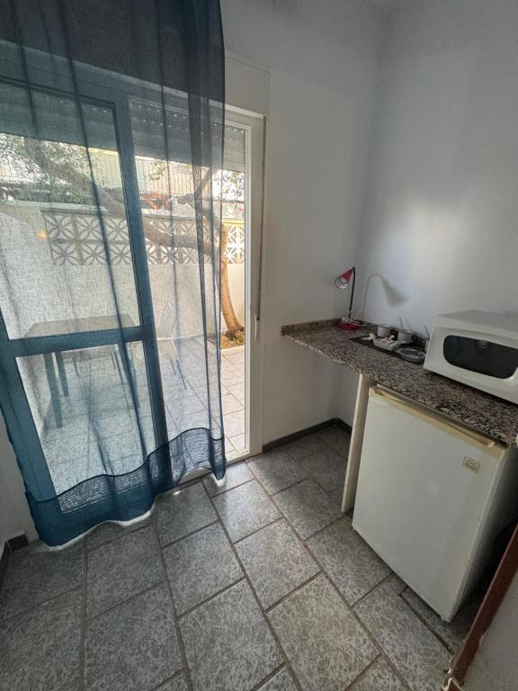 Kuchyň nebo kuchyňský kout v ubytování Hostal Miramar