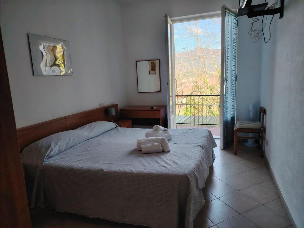 Postel nebo postele na pokoji v ubytování Hotel Silvia Framura - Cinque Terre