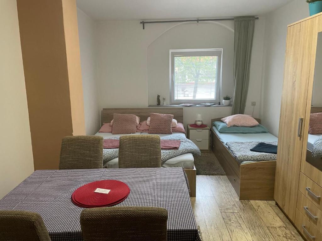 Postel nebo postele na pokoji v ubytování Penzion u Formana