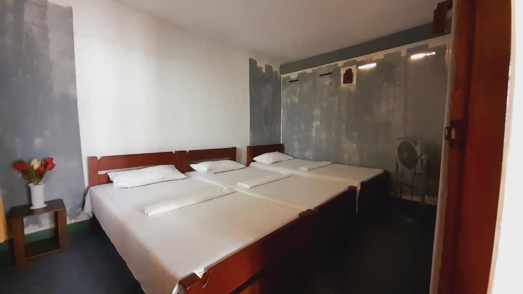 Postel nebo postele na pokoji v ubytování Jily Stay