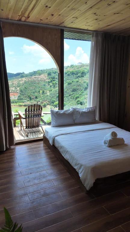 Postel nebo postele na pokoji v ubytování Mimoza homestay, Cầu Đất - Đà Lạt