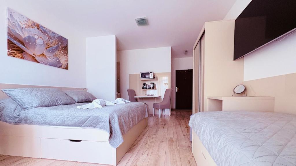 Posteľ alebo postele v izbe v ubytovaní Apartmán ELIZABETH