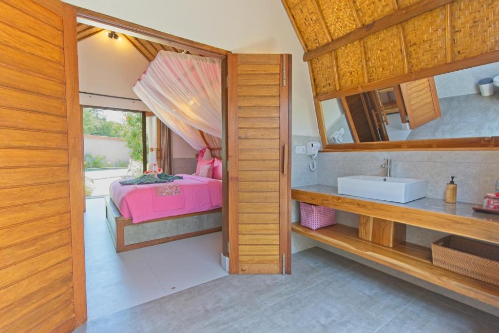 Postel nebo postele na pokoji v ubytování Chill Out Bungalows