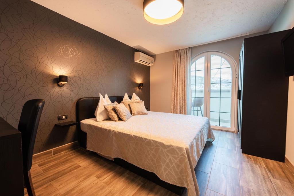 Postel nebo postele na pokoji v ubytování Bed & Breakfast Villa Terezija