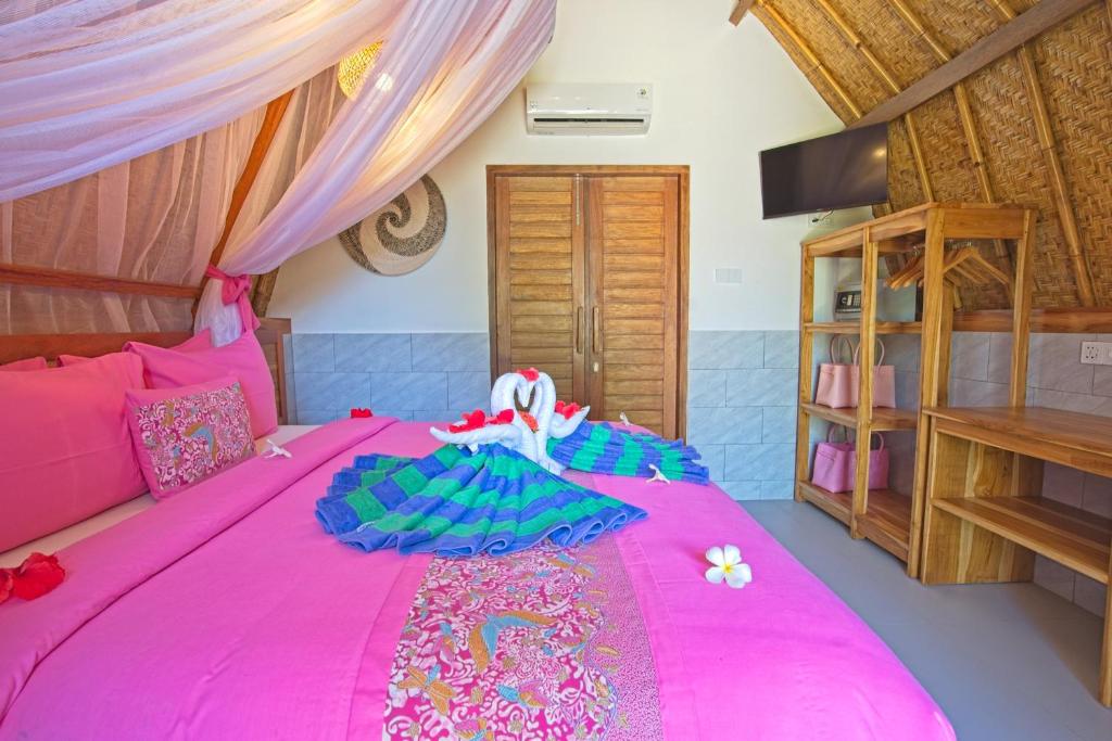 Postel nebo postele na pokoji v ubytování Chill Out Bungalows