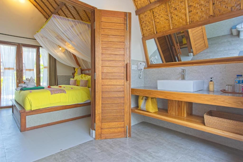 Postel nebo postele na pokoji v ubytování Chill Out Bungalows