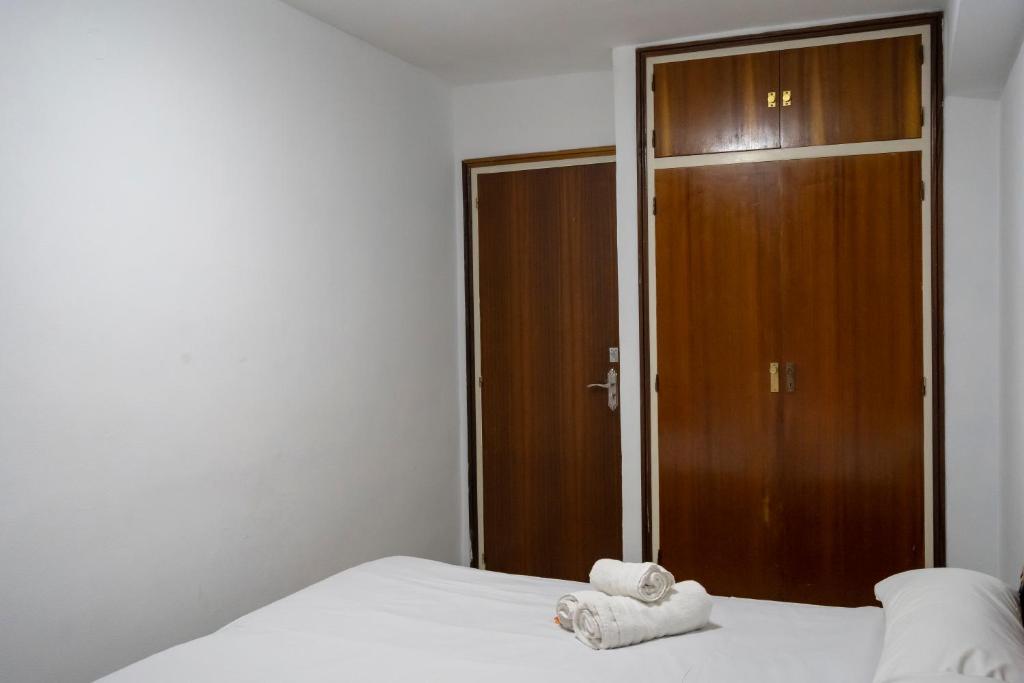 Posteľ alebo postele v izbe v ubytovaní Habitación Doble en La Victoria