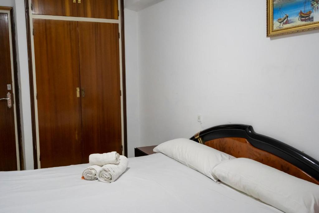 Posteľ alebo postele v izbe v ubytovaní Habitación Doble en La Victoria