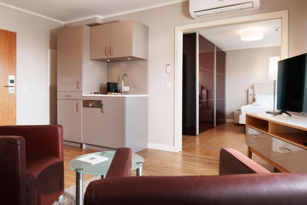 Kuchyň nebo kuchyňský kout v ubytování Hotel Meersinn - Binz