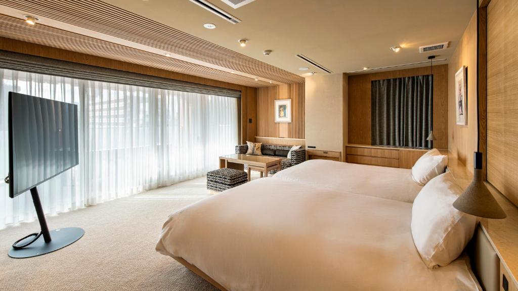 TV a/nebo společenská místnost v ubytování TERRACE HOTEL f 新大阪