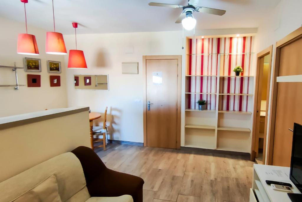 Televízia a/alebo spoločenská miestnosť v ubytovaní Apartamento super luminoso