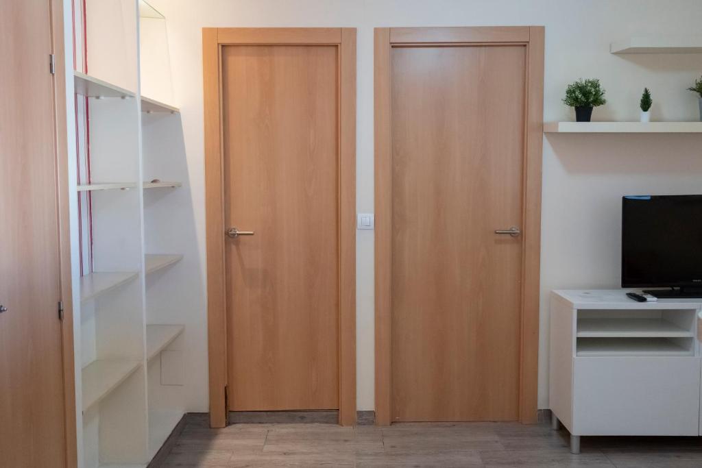 Televízia a/alebo spoločenská miestnosť v ubytovaní Apartamento super luminoso
