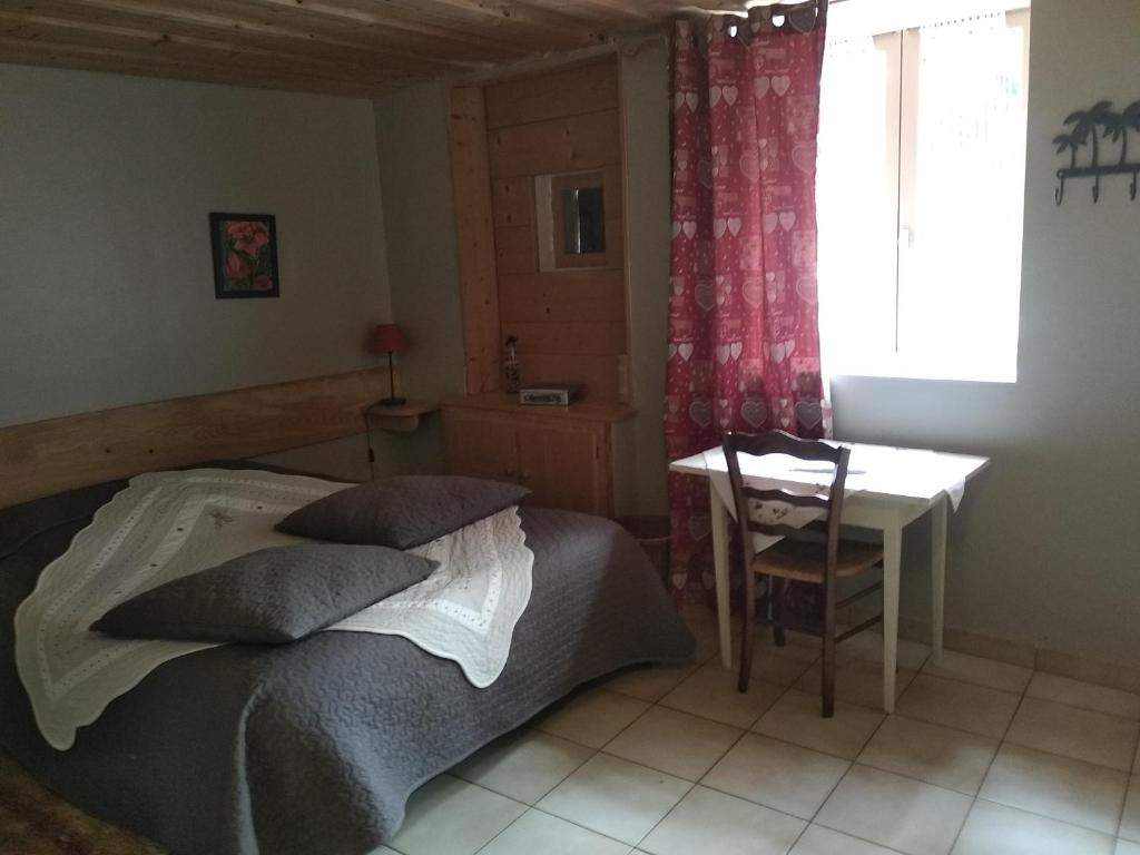 Postel nebo postele na pokoji v ubytování Che'Val d'Amour