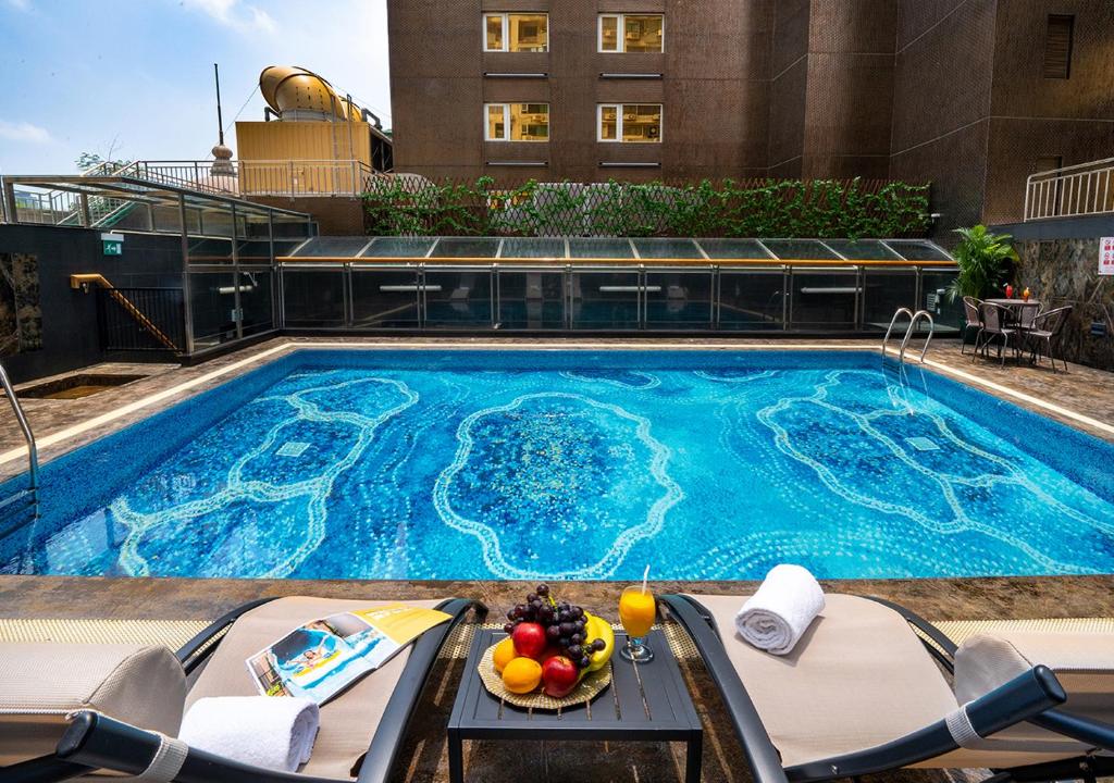 Bazén v ubytování Grand Dragon Hotel nebo v jeho okolí