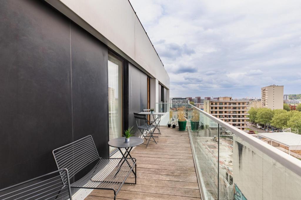 Balkón alebo terasa v ubytovaní Magnifique appartement Paris, bord du canal