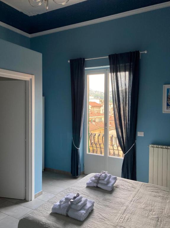 Postel nebo postele na pokoji v ubytování Oltre il Blu