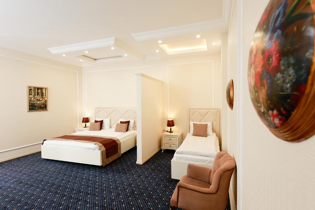 Ένα ή περισσότερα κρεβάτια σε δωμάτιο στο East Legend Hotel