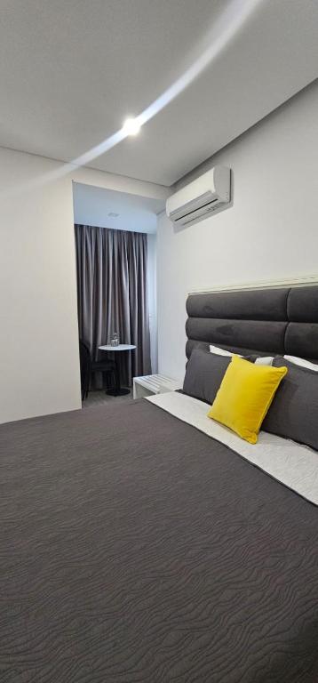 Postel nebo postele na pokoji v ubytování Edina by Hp Hotel