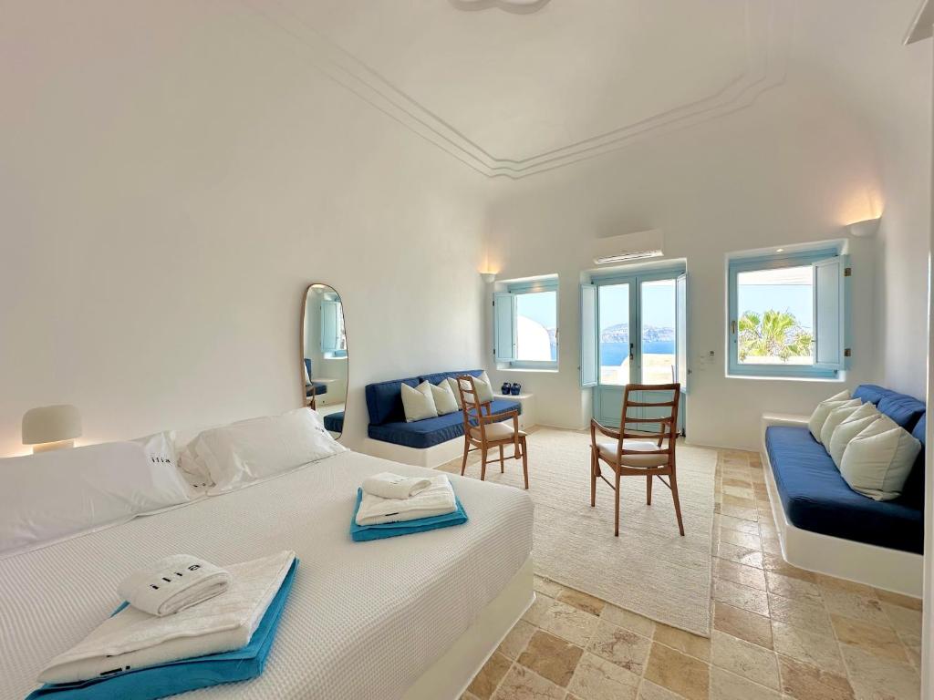 Ένα ή περισσότερα κρεβάτια σε δωμάτιο στο Ilia Oia