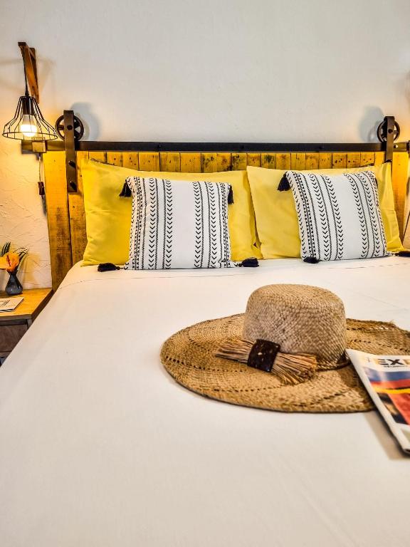 Postel nebo postele na pokoji v ubytování Maison d'hôtes Villa des Mascareignes