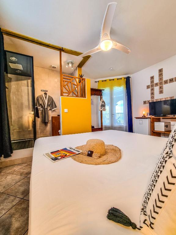 Postel nebo postele na pokoji v ubytování Maison d'hôtes Villa des Mascareignes