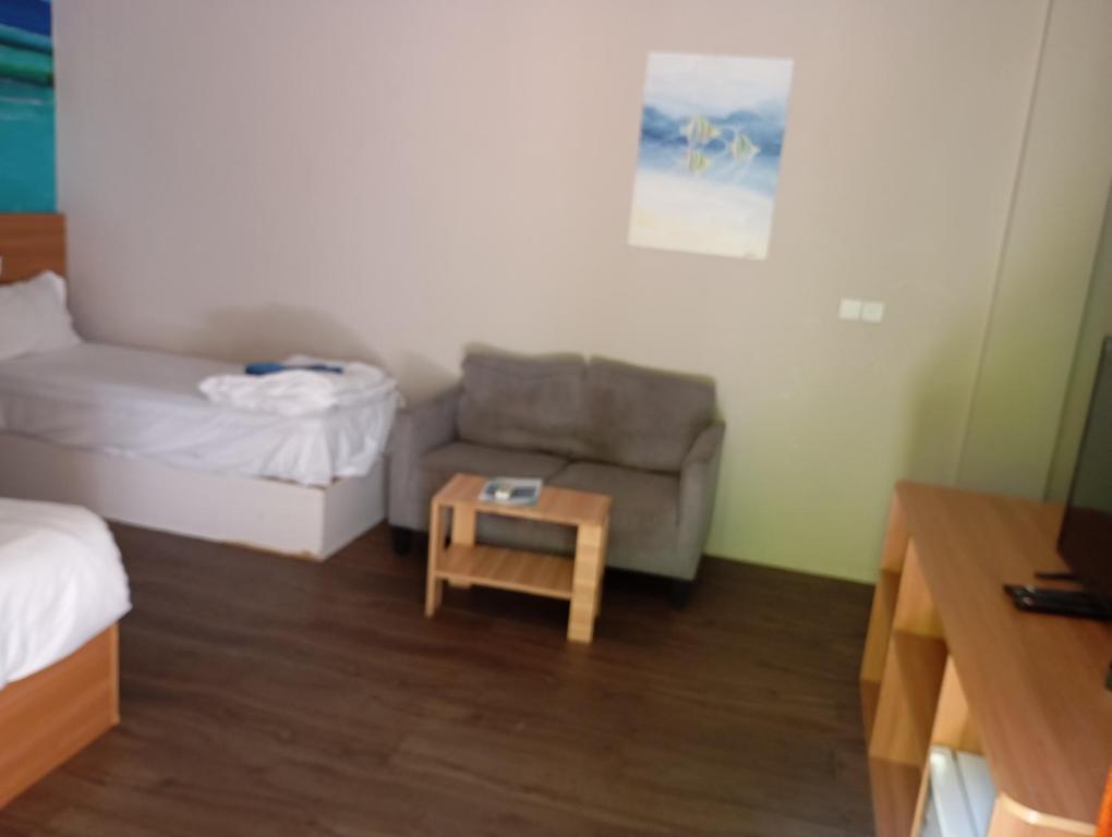 Postel nebo postele na pokoji v ubytování Seaview by Ukulhas