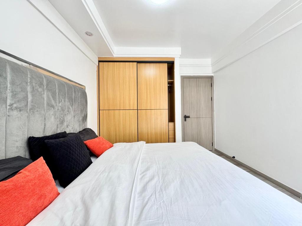 Postel nebo postele na pokoji v ubytování Homey Hideout