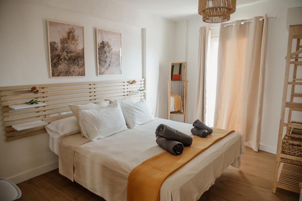Postel nebo postele na pokoji v ubytování REFORMADO Apartamento Los Jereles