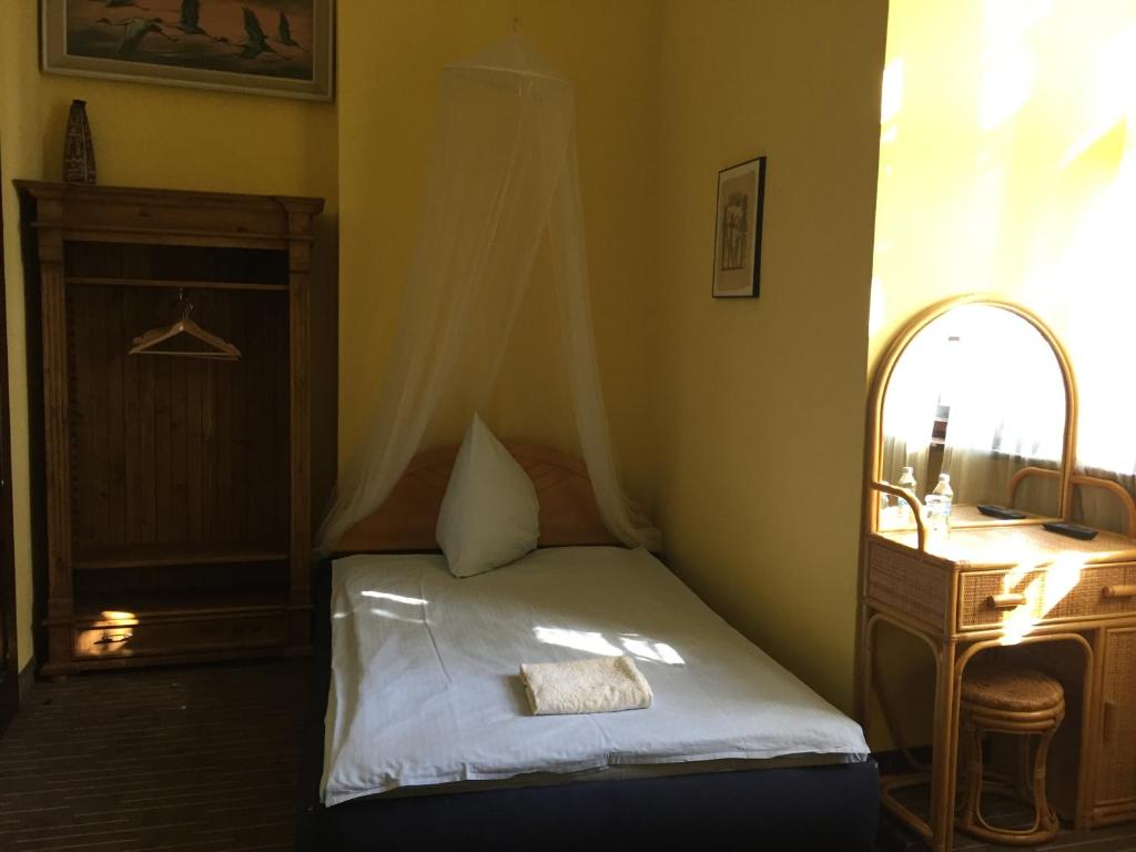 Postel nebo postele na pokoji v ubytování Zamek Dobra