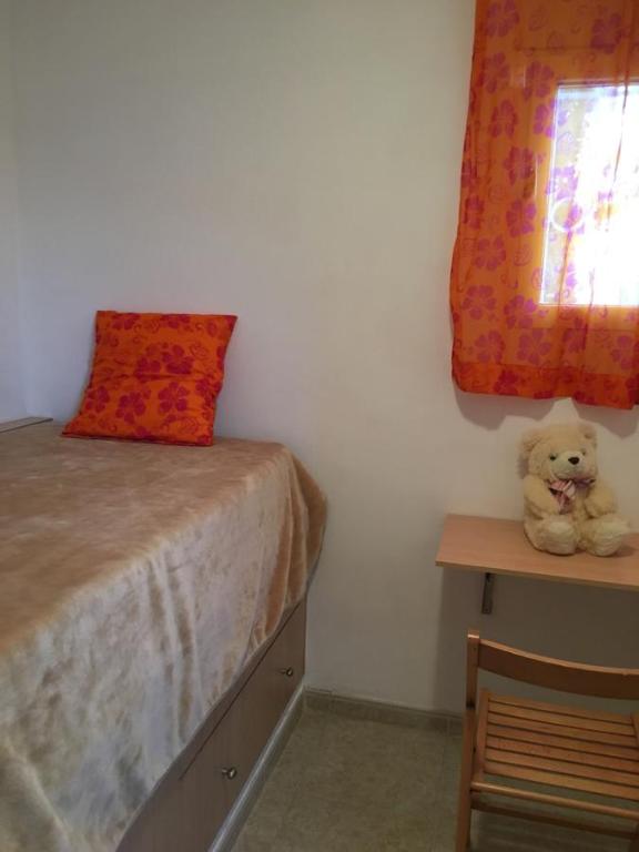 Postel nebo postele na pokoji v ubytování Adosado Playa Almadrava