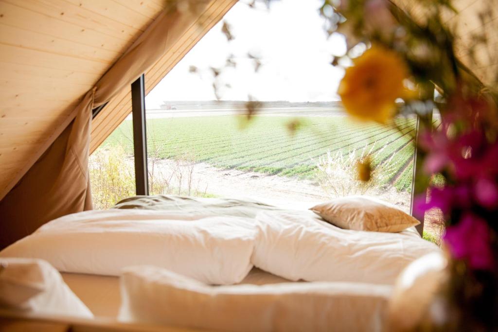 Postel nebo postele na pokoji v ubytování Ecohome Zilt - 8 pers - Zeezand Recreatie