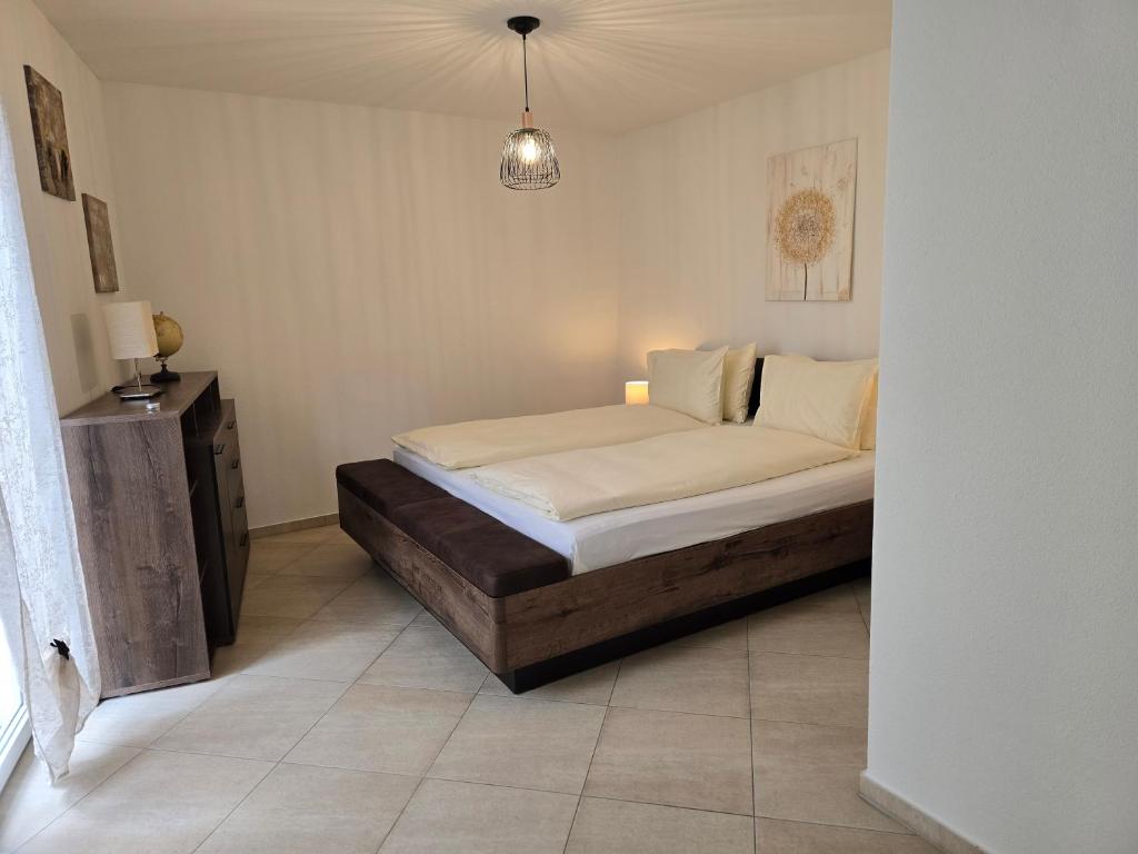Letto o letti in una camera di Depandance Garni Golf
