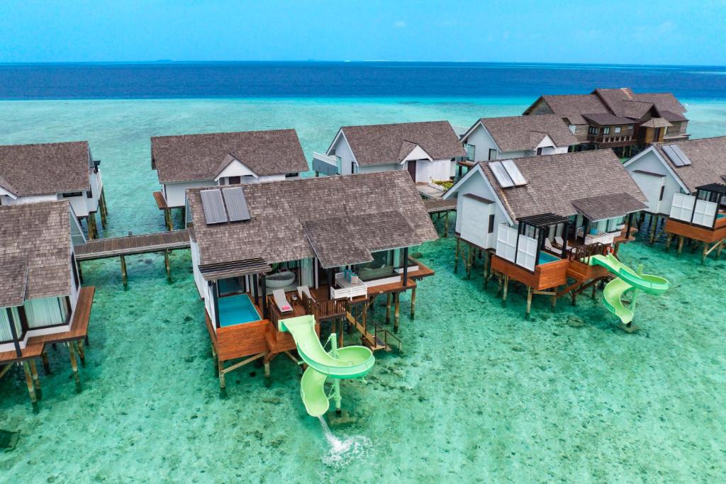 an aerial view of a resort on the water at OZEN LIFE MAADHOO - Luxury All Inclusive with Free Transfers in South Male Atoll