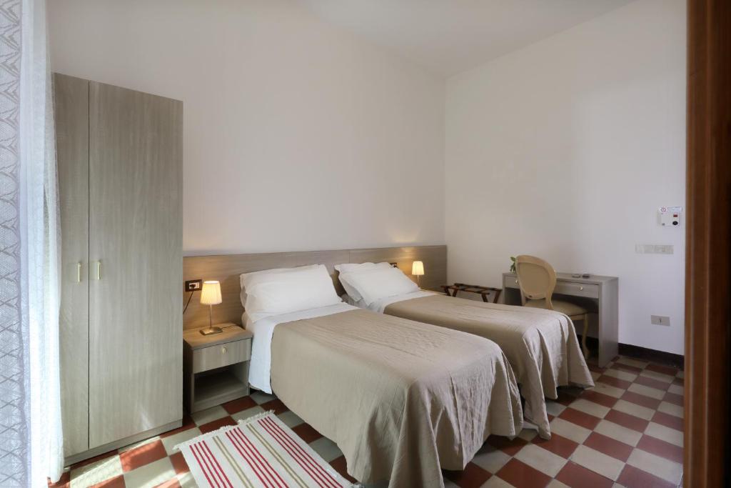 Cama o camas de una habitación en Villa Astoria